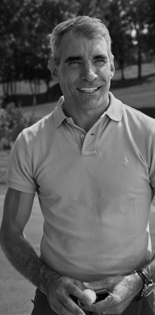 Marcel Lendenmann smiling, standing on the green